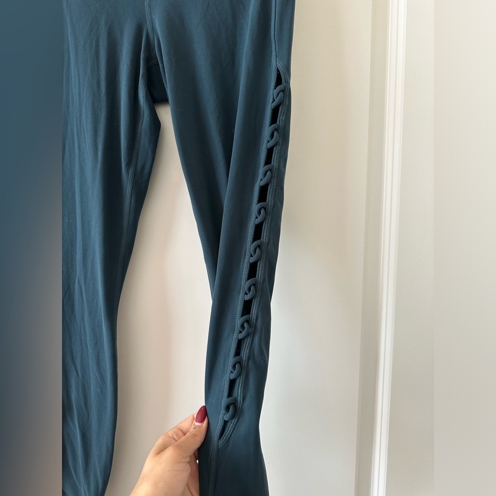 TEAL Color: Athleta Shiva 7/8 Leggings. Cut out sides. Size Small. EUC
